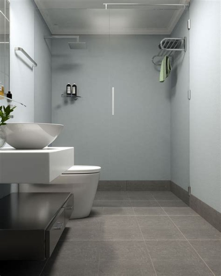 Do you grout between tile and wall in shower?