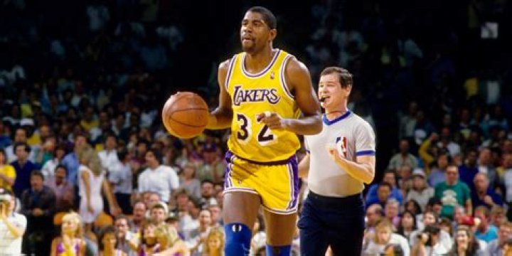 Does Magic Johnson own a basketball team?