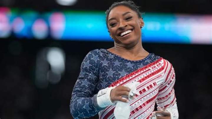 Does Simone Biles cheer for the Texans?