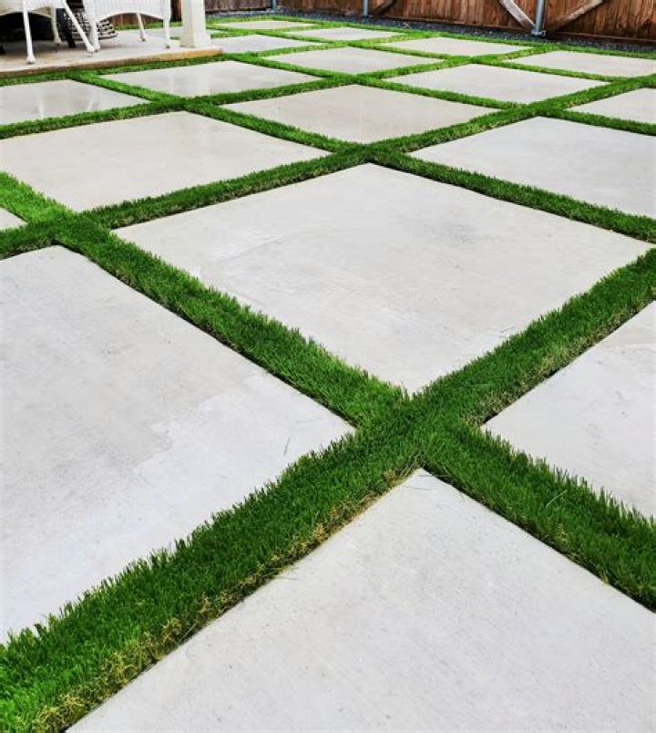 How do you glue artificial grass to concrete?