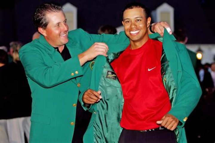 How many green jackets does Tiger Woods?