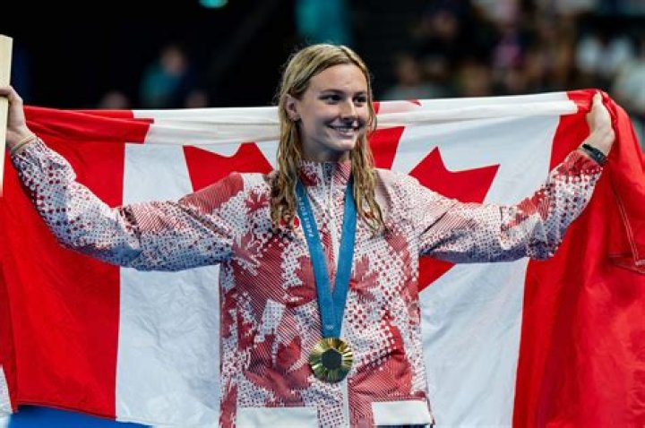 How old is McIntosh Canadian swimmer?