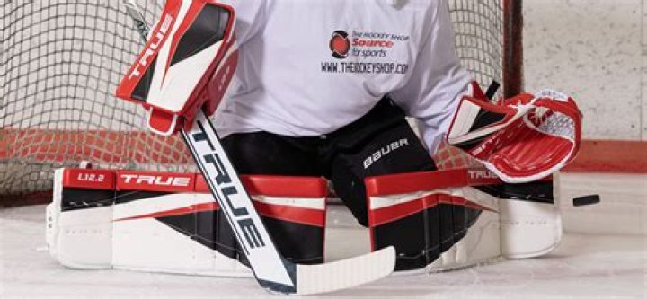 What do hockey goalies wear under their leg pads?