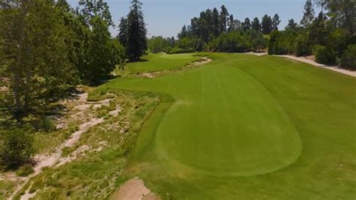 What do red stakes mean on a golf course?