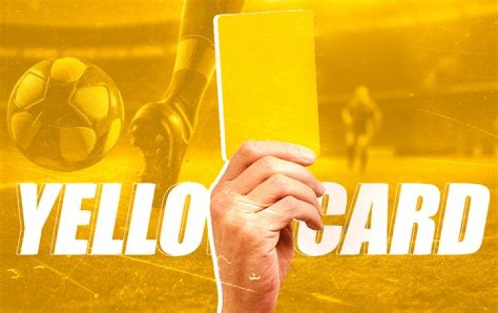 What does a yellow card mean in football?