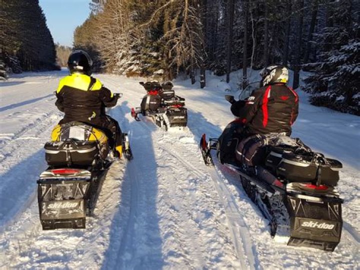 What should you do before trailering your snowmobile?