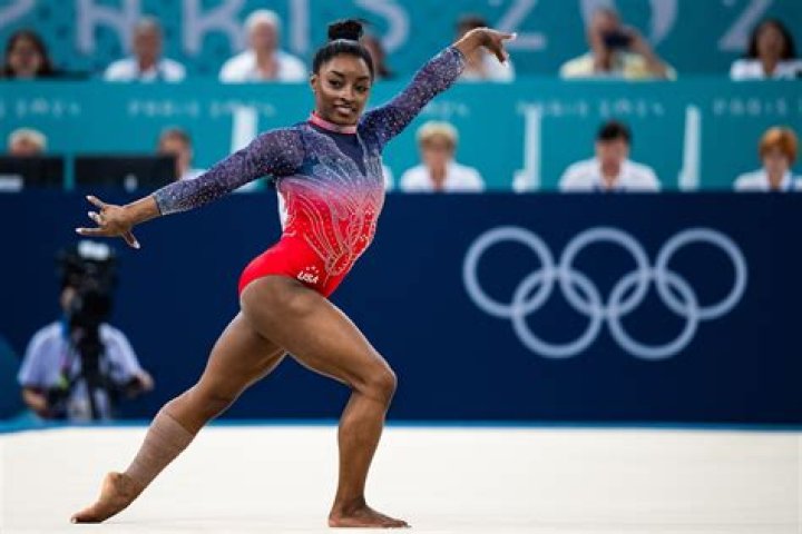 What sport does Simone Biles play?
