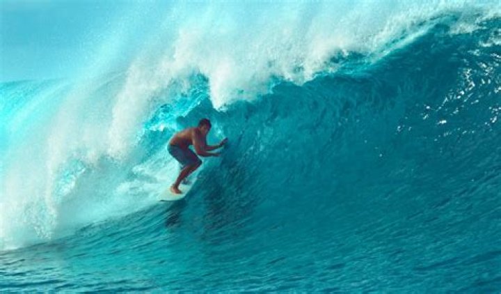 Where did surfing begin?