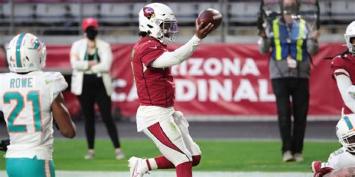 Who was the first quarterback to throw for 5000 yards in a season?