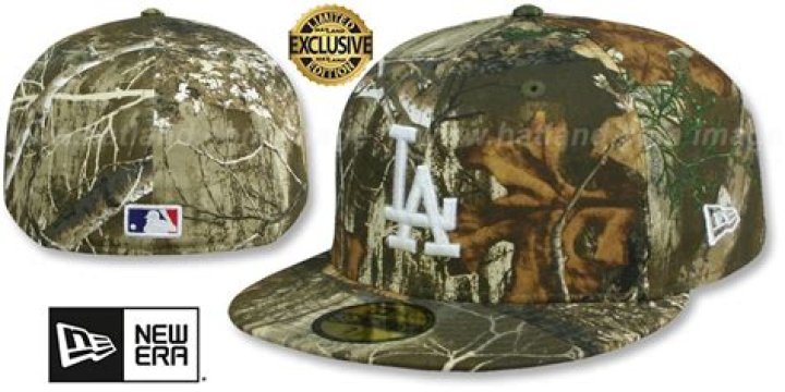 Why are the ball players wearing camouflage caps?