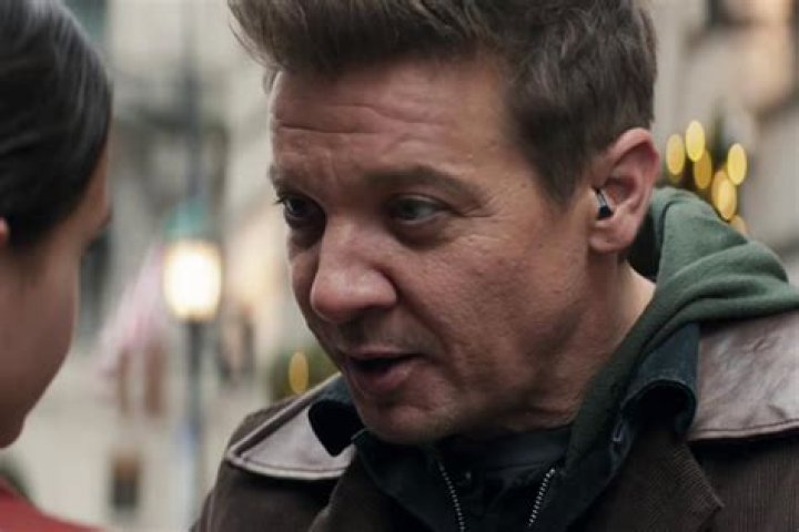 Why does Hawkeye use a hearing aid?