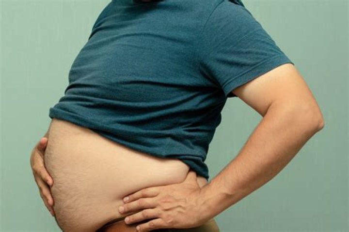 Why is my upper stomach so big?